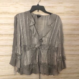 Women’s gray and silver blouse size medium.